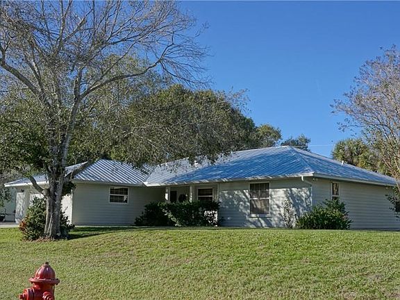 Conveniently located on 1/2 an acre on quiet dead end street, close to shopping, restaurants and houses of worship.  There is no