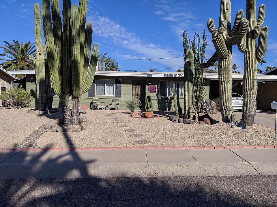 Front yard with 2 car carport. Landscape maintenance included!