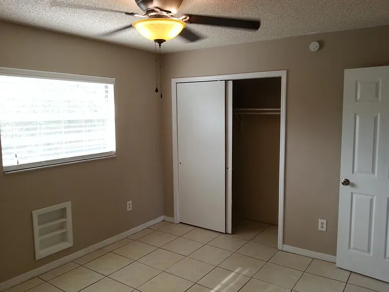 rear bedroom is 10.5 feet by 13 feet