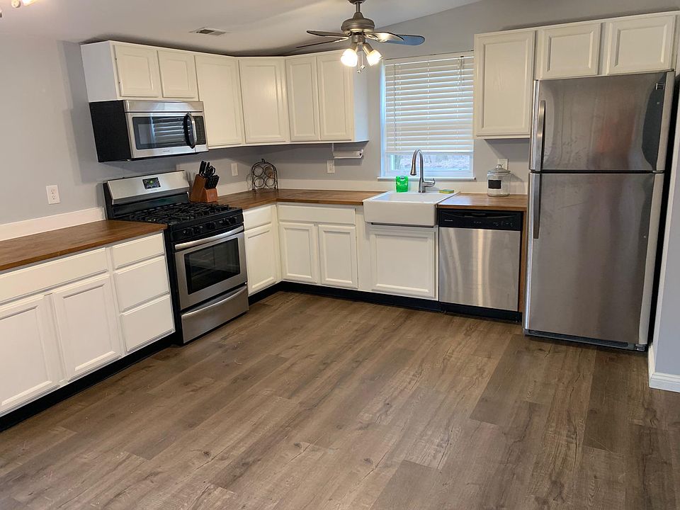 Large Kitchen with New Stainless Steel Appliances and plenty of storage.
