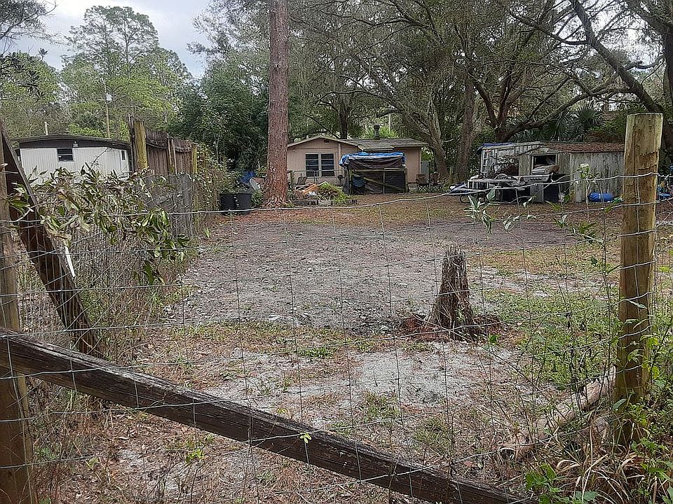 Tan house. Back of house