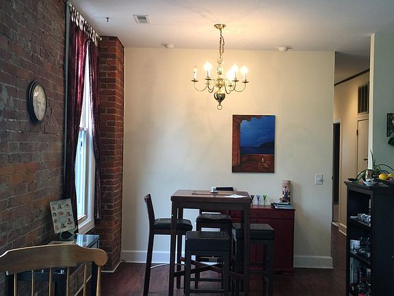 Dining room off of living room. Window access to fire escape. Perfect for a container garden in the spring and summer.
