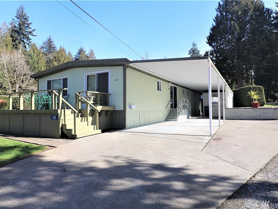 Front with Large Carport and front deck