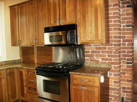 New kitchen; stove, microwave.