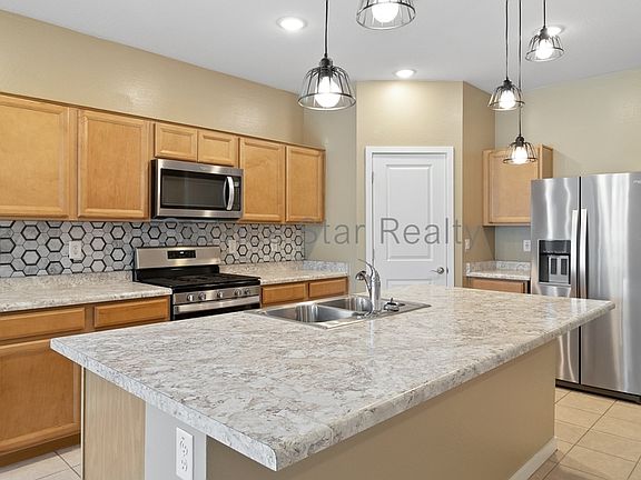 5th image of 40185 W Williams Way