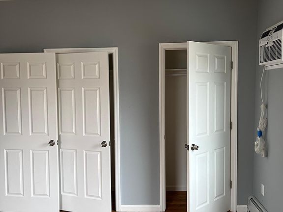 Bedroom two closets and wall a/c