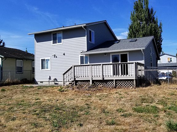 Fully fenced in backyard with locking alley access 