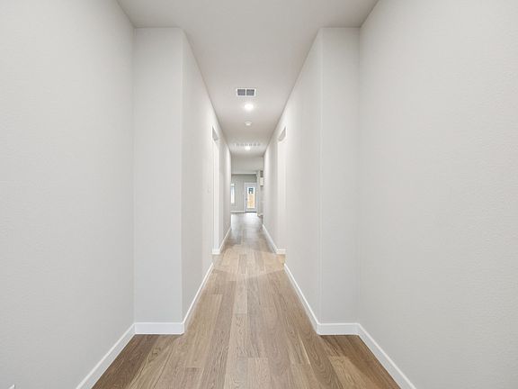 Entryway in the Oscar home plan by Trophy Signature Homes - REPRESENTATIVE PHOTO