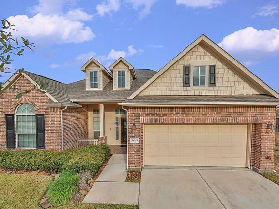 Wonderful landscaping enhances this spacious home