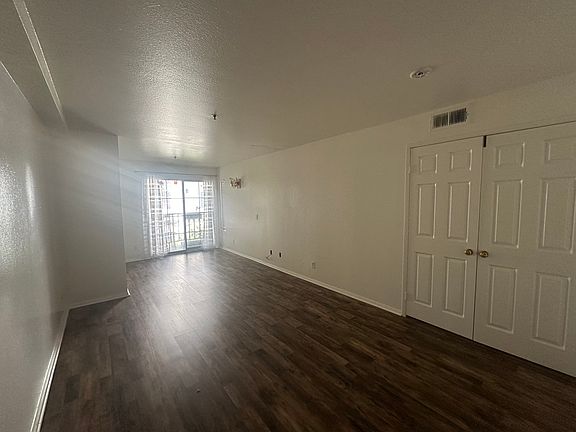 Large master bedroom with patio access