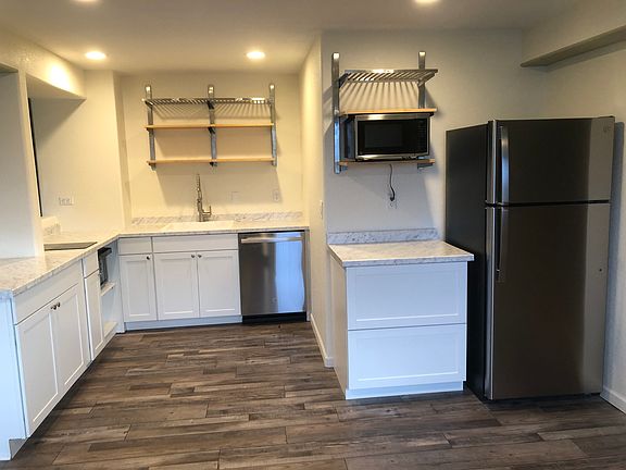 Brand New Kitchen - Dishwasher, fridge, microwave, 10-1 Ninja Oven, Washer, and Dryer included in other room.