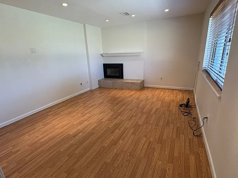 lower living room, just off the garage. Working gas fireplace!