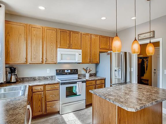 Kitchen showing access to garage