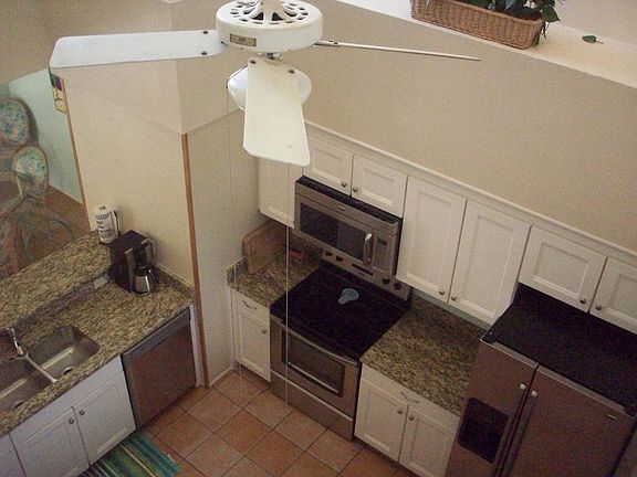Upstairs loft looking down into kitchen.