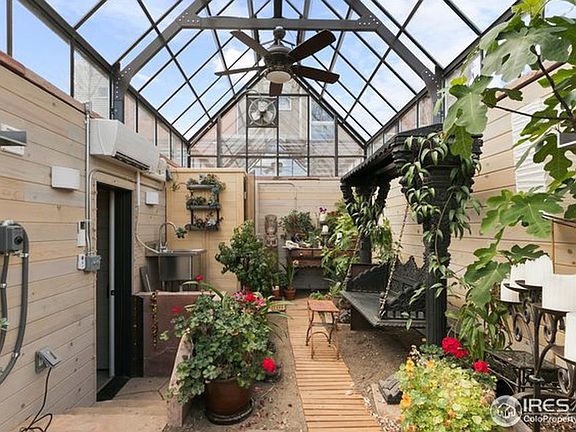The interior greenery of the greenhouse is always changing but the orientation remains the same. It is oriented east to west on the property for maximum sunlight.