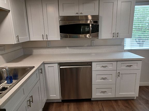Microwave, dishwasher, and sink