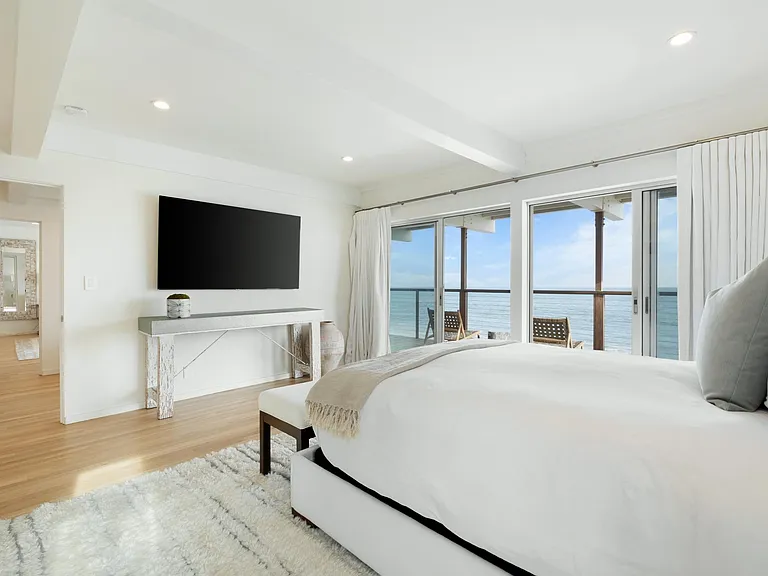 Tuck yourself into the luxurious bed for sweet slumber.