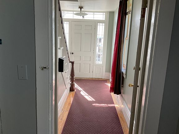 View of front hallway from inside unit