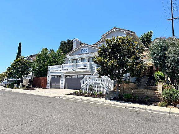 Recent Upgrades: Freshly painted exterior with designer colors, luxurious white carpet throughout, and granite countertops in all key areas.