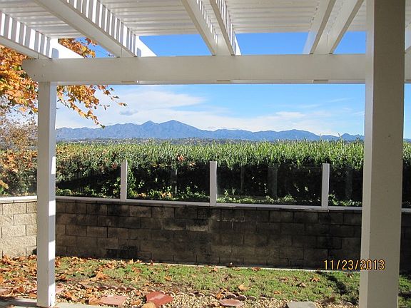 BACK PATIO WITH GRASS AND VIEW