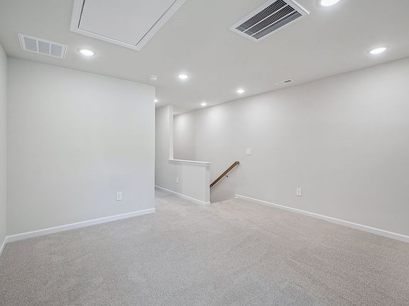 An upstairs loft lends itself to your own office space or homework area.