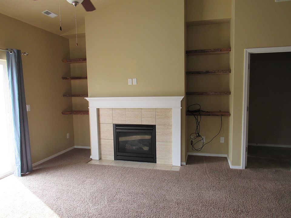 Fireplace with Built In wood Shelving