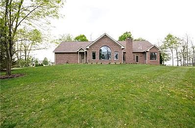 Home sets up on a hill with beautiful nature view of the 4.9 AC on this wooded lot that back ups to private creek.