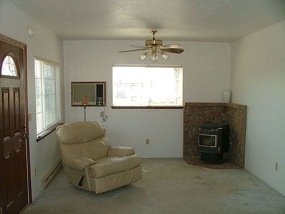 Whitfield pellet stove features gold accents!