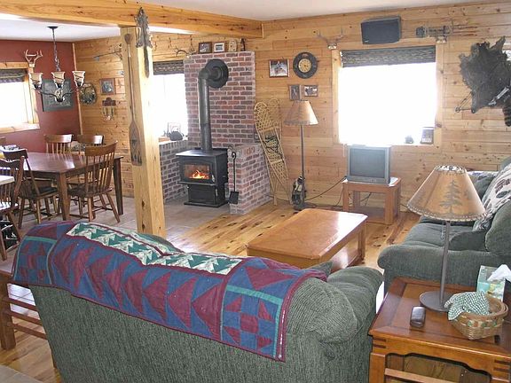 Large livingroom. Energy efficient furnace, wood burning stove.