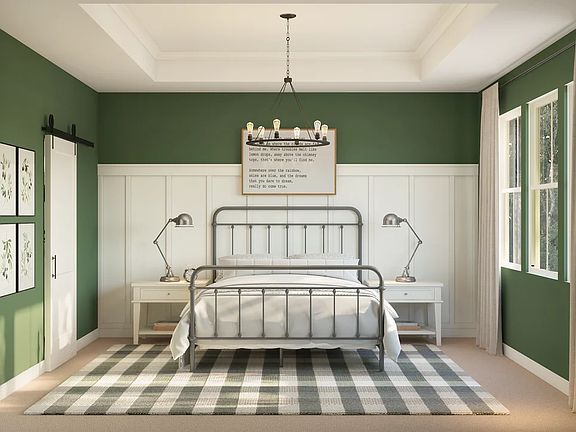 Primary suite with decorative feature wall and crown moulding