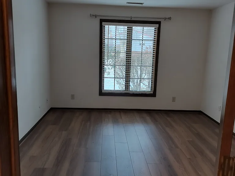Brand new wood laminate flooring and fan/light with remote.
