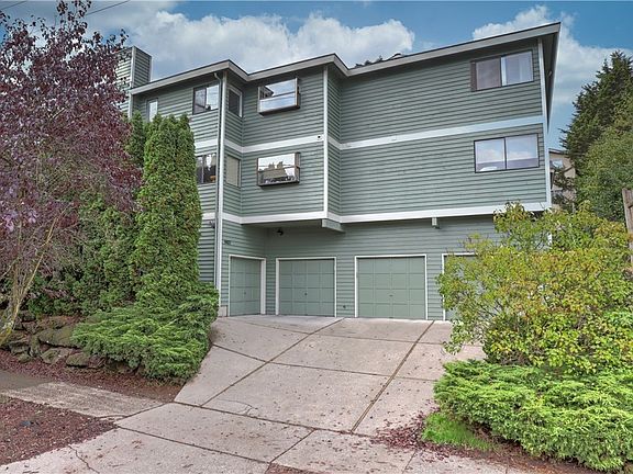 TOP FLOOR!  This two-bedroom, two-bath home has all you'd want in a sought-after location in Greenwood with lots of off-street parking, multiple parks, library, cafes, and shopping opportunities.