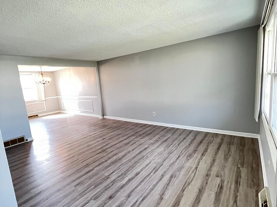Family Room. Entire unit has fresh paint/new floors