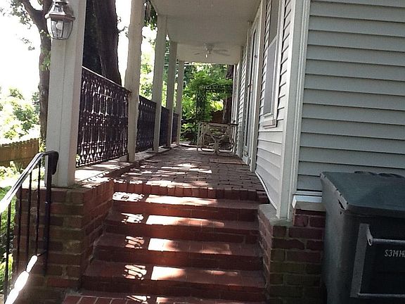Front porch entry to house & patio