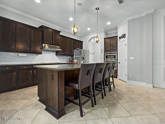 3rd image of 4420 CASTLE PALM Court
