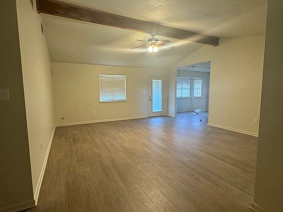 Spacious and bright with easy access to the backyard through a full-lite glass back door with built-in blinds. Perfect for relaxing or entertaining.