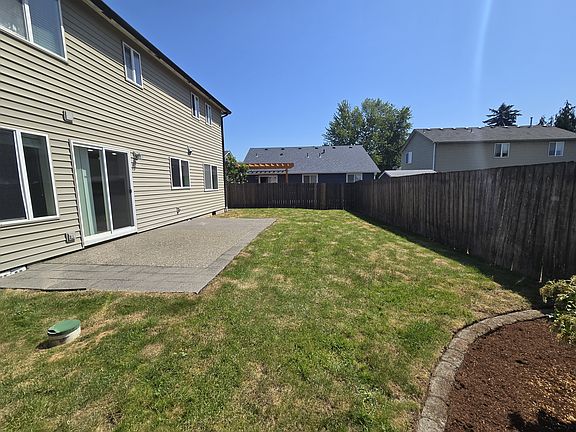 Fenced Backyard, stone patio