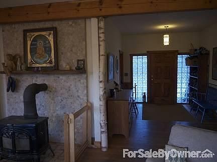 Front of the House with Bloosoms
						:
						Taken from the upstairs of the barn.