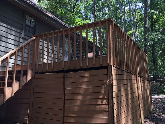 Covered storage under deck
