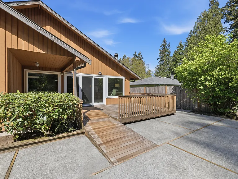 Rear patio and deck with direct backyard access