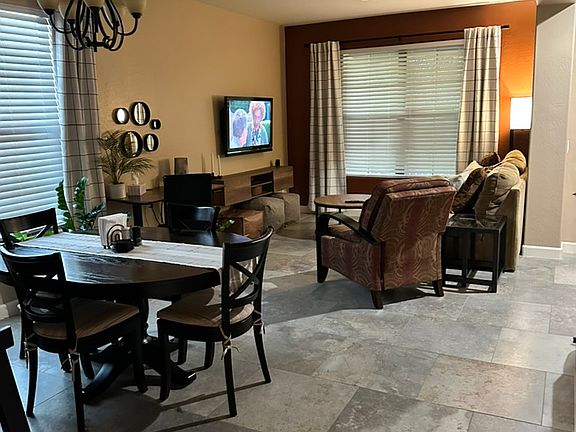 Front of house and formal dining space.