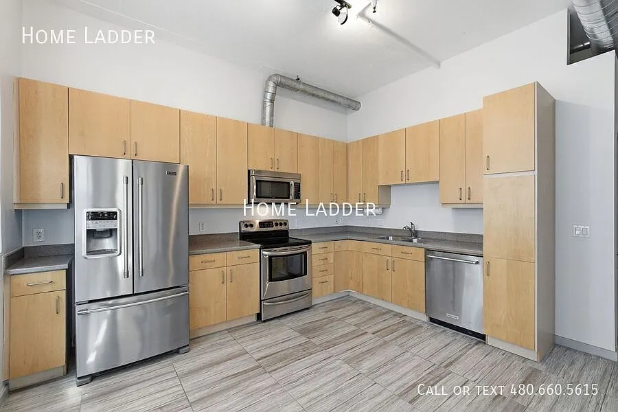 $1,000 Off First Months Rent! Move-In Ready Condo at Third Avenue Lofts | Garage Parking, Pool & ... — Photo 1