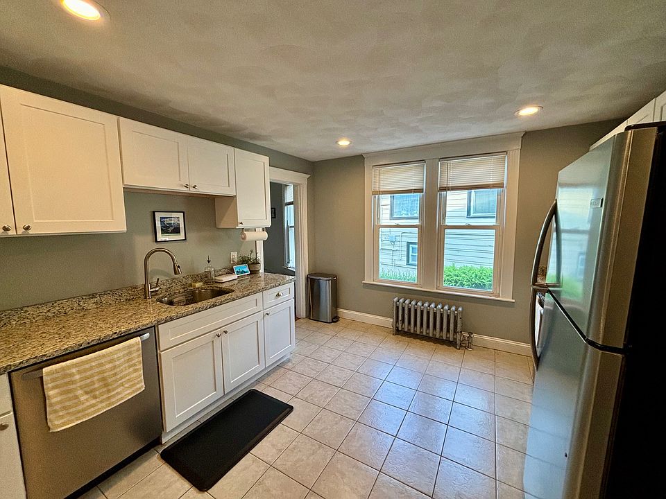Newly renovated kitchen with white shaker cabinets, granite counter tops and stainless steel appliances!
