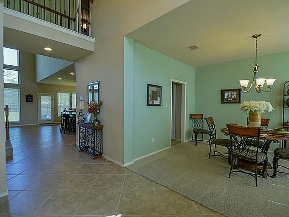 Entry welcomes you with high ceilings and open foyer.