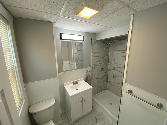 bathroom, shower door to be installed