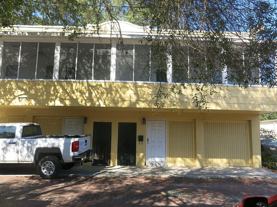 View of the two 1 bedroom with private studios from alley. 
