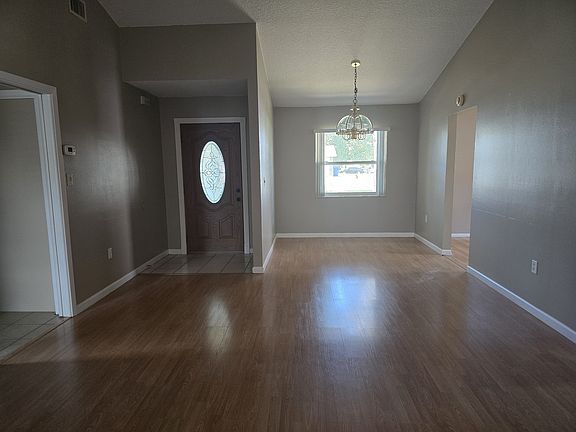 Front door and dining area