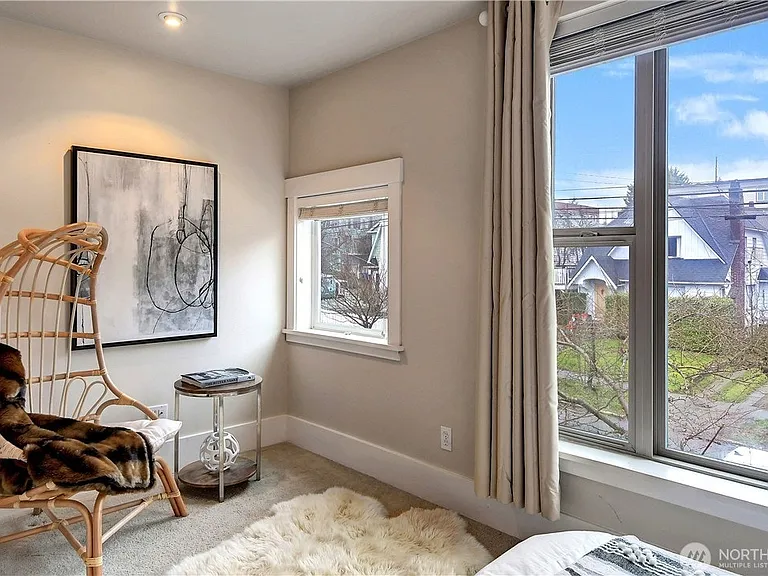 This nook of the master bedroom can be a seating area or host a large chest of drawer. That wall is wired with a cable jack so you can mount a TV to the wall or set a TV on a dresser.