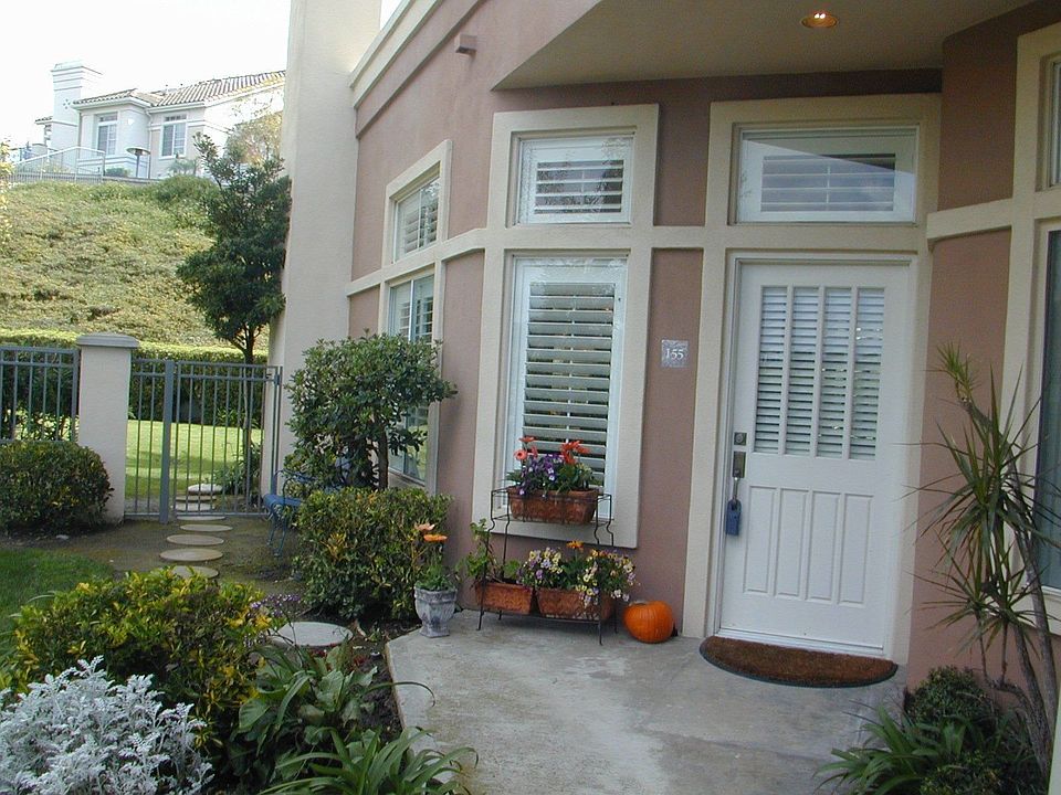 Front View of Home w/ Largest Yard in Community