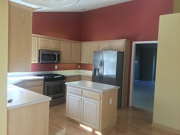 Open Concept Kitchen with upgraded stainless steel appliances